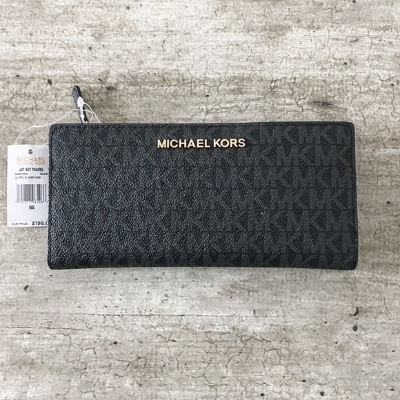 Michael Kors Handbags - NWT Michael Kors Signature Jet Setter Wallet